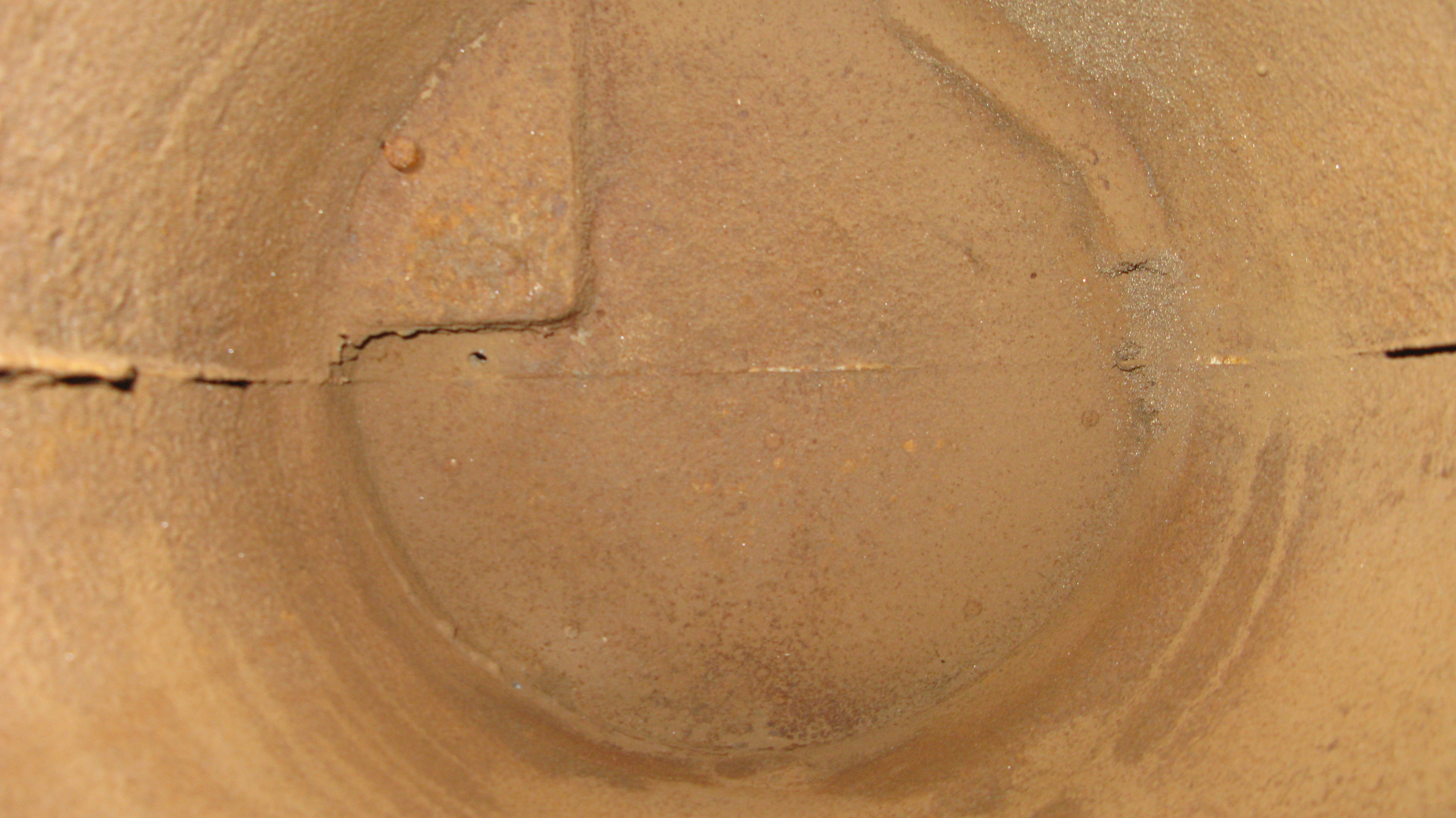 A very seldom seen view from inside the base looking up toward the underside of the main mail holding part of the box body. The two halves of the casting are very apparent