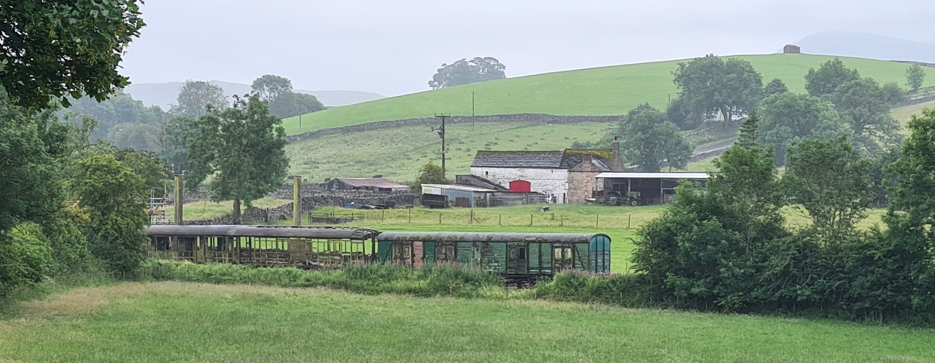 Old railway carriages invariably make their way into farmers fields for use as storage sheds