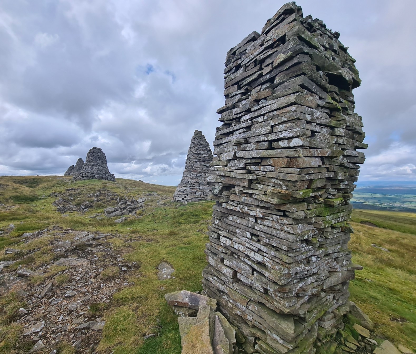 Five of the nine cairns