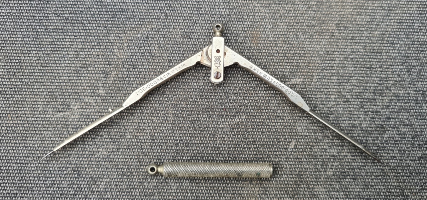 Dividers could potentially be opened far wider than the relatively short 4 centimetre scale provided with the dividers, then measured against any centimetre scale, even that usually found at the base of a map