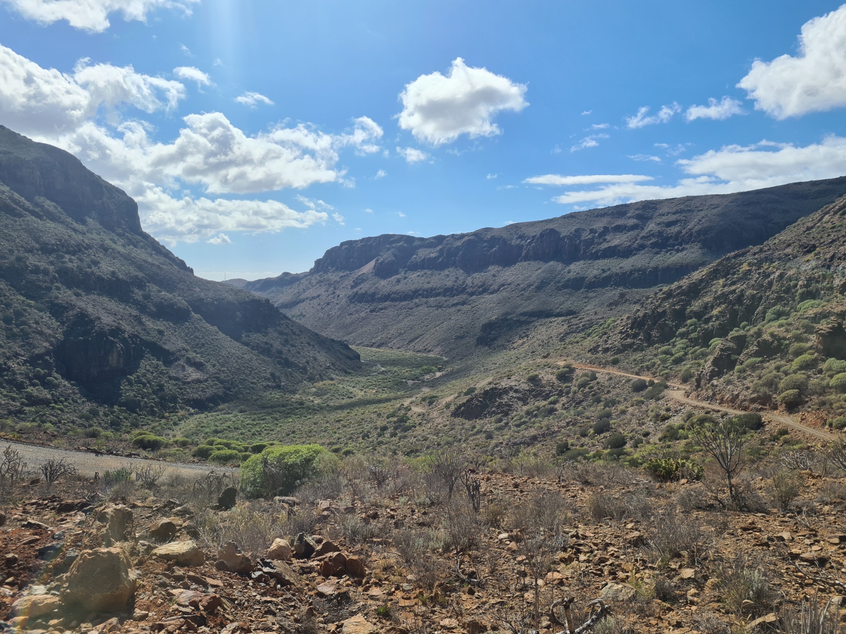 Dirt track winds its way up into the hills