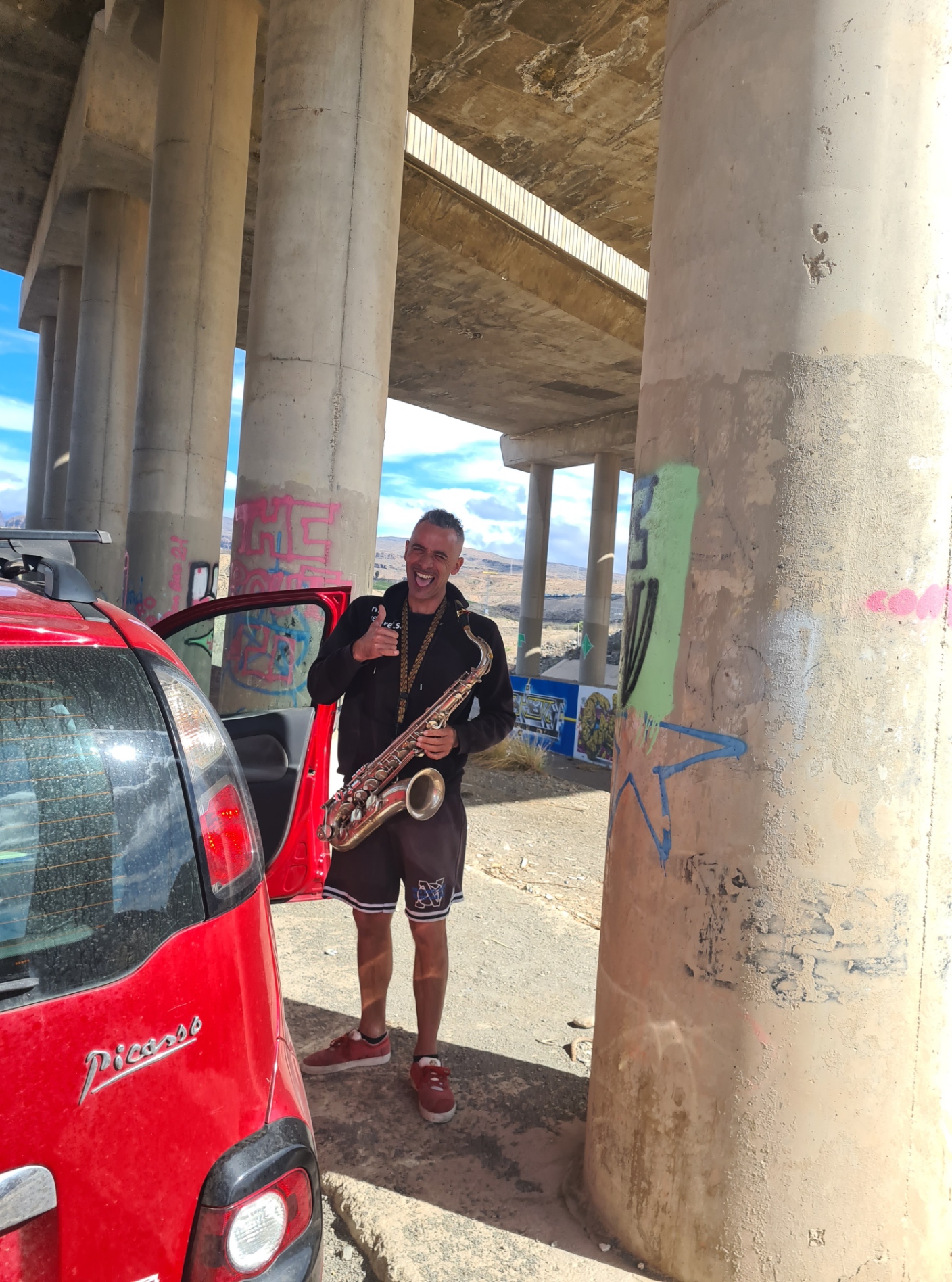 Practicing saxophonist on the outskirts of Maspalomas