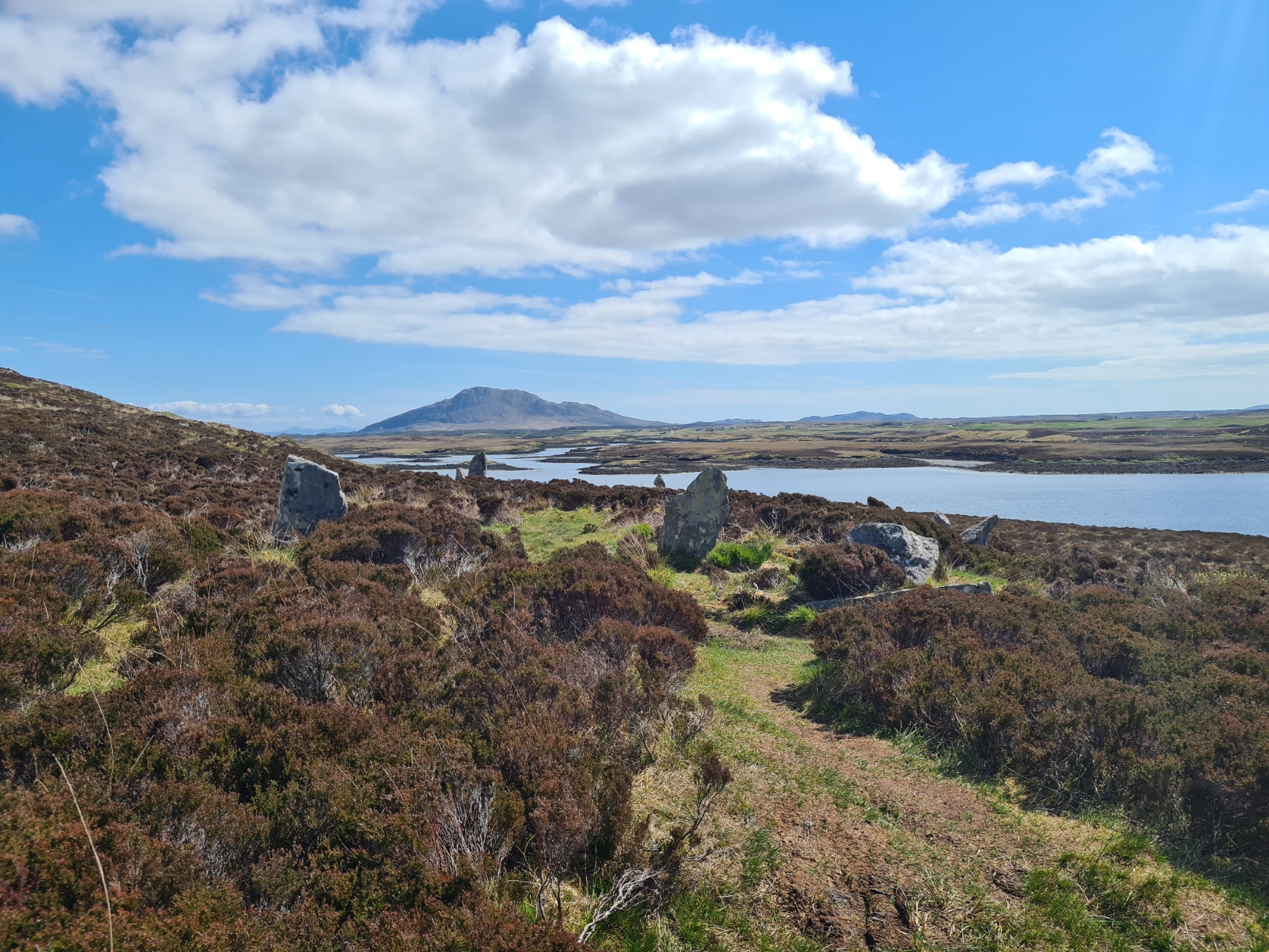 Stone Circle Pobull. Beyond is Eaval, the highest summit on North Uist