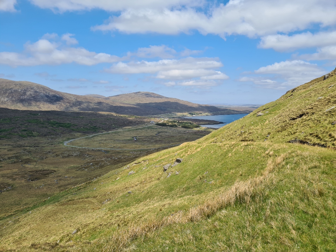 The trail descends toward Gleann Sgaladail and Loch Seaforth