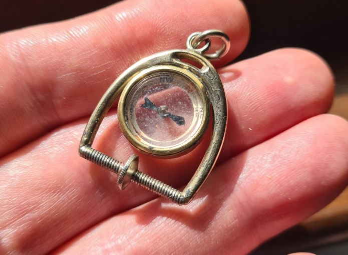 Munn's Map Measure and Compass, in the hand