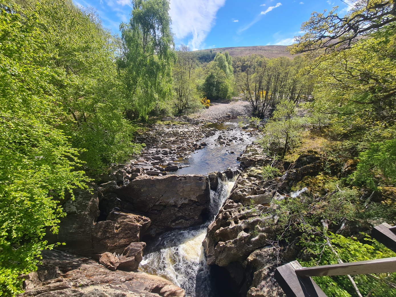 The view from the bridge shows the route onward, following the right bank to the river toward Achnacochine